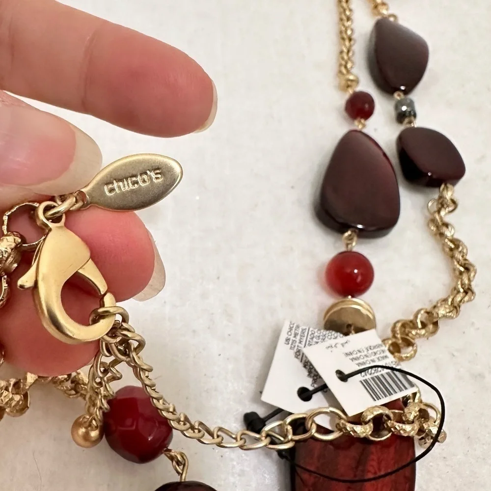 New Chicos gold tone long necklace with chunky ruby red beads, adjustable length